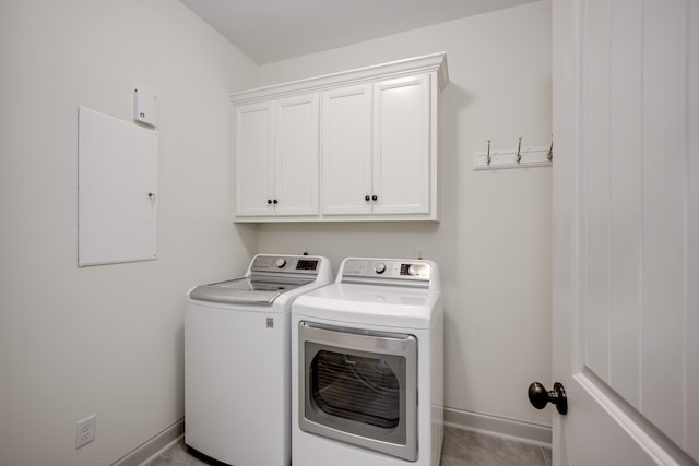 210 Rivernorth Dr, North Augusta, SC 29841 - laundry area featuring washer and dryer and cabinet space