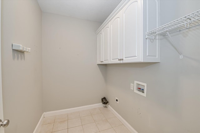 1132 Sumter Landing Cir, Evans, GA 30809 - laundry room featuring hookup for a washing machine, light tile patterned flooring, baseboards, cabinet space, and electric dryer hookup