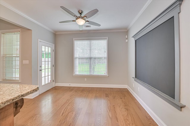 1132 Sumter Landing Cir, Evans, GA 30809 - unfurnished dining area featuring light wood finished floors, ornamental molding, baseboards, and ceiling fan