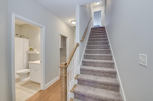 1132 Sumter Landing Cir, Evans, GA 30809 - stairway with baseboards and wood finished floors