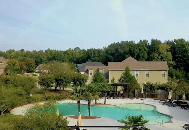 1132 Sumter Landing Cir, Evans, GA 30809 - community pool with a patio area and a pergola