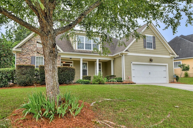 1132 Sumter Landing Cir, Evans, GA 30809 - traditional-style house with driveway, a front yard, roof with shingles, and stone siding