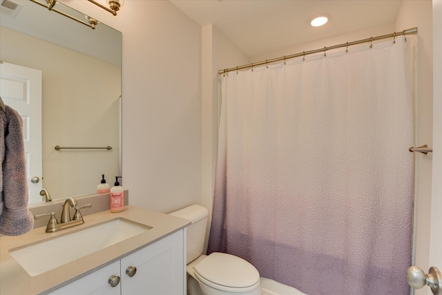 bathroom with vanity, toilet, a shower with shower curtain, recessed lighting, and visible vents