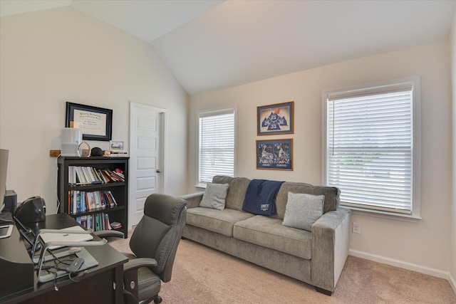home office featuring carpet floors, baseboards, and lofted ceiling