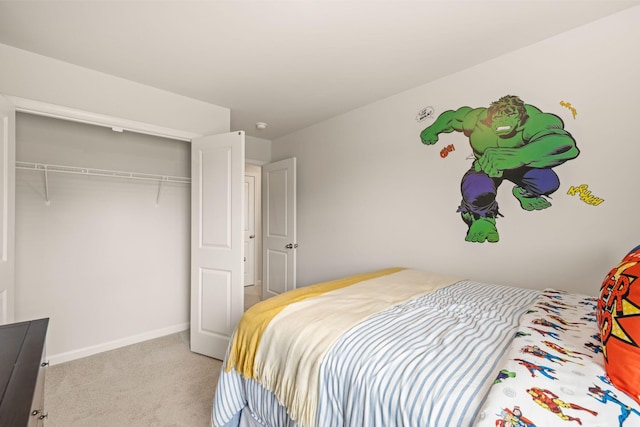 carpeted bedroom featuring a closet