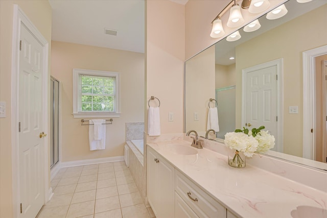 327 Peter Carnes Dr, North Augusta, SC 29860 - bathroom featuring double vanity, a bath, tile patterned flooring, and a stall shower