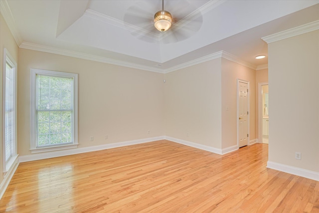 327 Peter Carnes Dr, North Augusta, SC 29860 - unfurnished room with light wood finished floors, a ceiling fan, a raised ceiling, baseboards, and crown molding