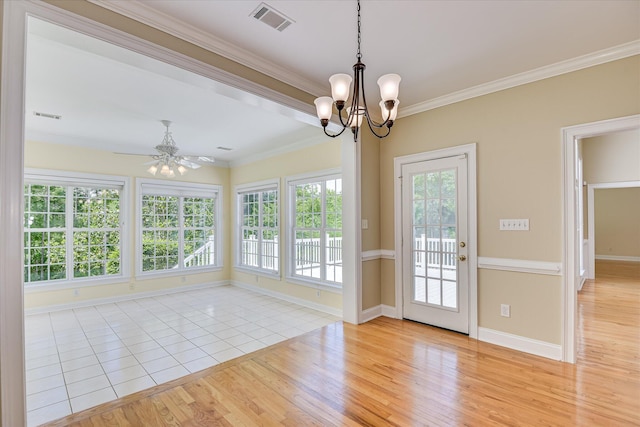 327 Peter Carnes Dr, North Augusta, SC 29860 - unfurnished sunroom featuring ornamental molding, wood finished floors, baseboards, and a chandelier