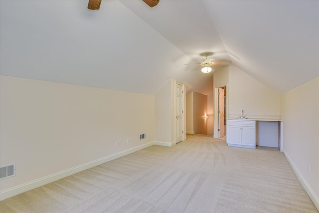 327 Peter Carnes Dr, North Augusta, SC 29860 - additional living space featuring ceiling fan, vaulted ceiling, light carpet, a sink, and baseboards