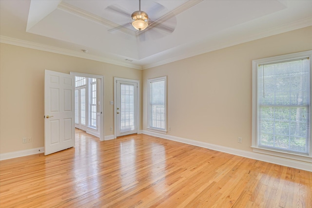 327 Peter Carnes Dr, North Augusta, SC 29860 - empty room with a raised ceiling, light wood-style flooring, a ceiling fan, baseboards, and ornamental molding