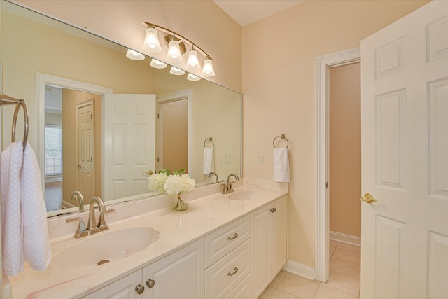 327 Peter Carnes Dr, North Augusta, SC 29860 - full bath with double vanity, tile patterned flooring, and baseboards
