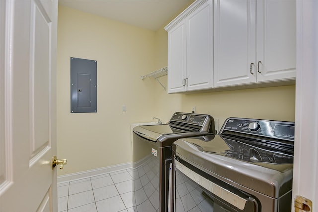 327 Peter Carnes Dr, North Augusta, SC 29860 - laundry area with electric panel, cabinet space, washer and clothes dryer, light tile patterned floors, and baseboards