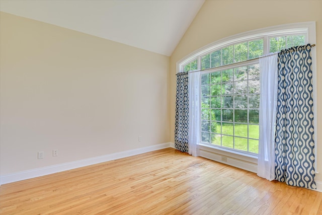 327 Peter Carnes Dr, North Augusta, SC 29860 - spare room with light wood-style floors, healthy amount of natural light, baseboards, and high vaulted ceiling