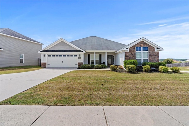 ranch-style home featuring a garage and a front lawn