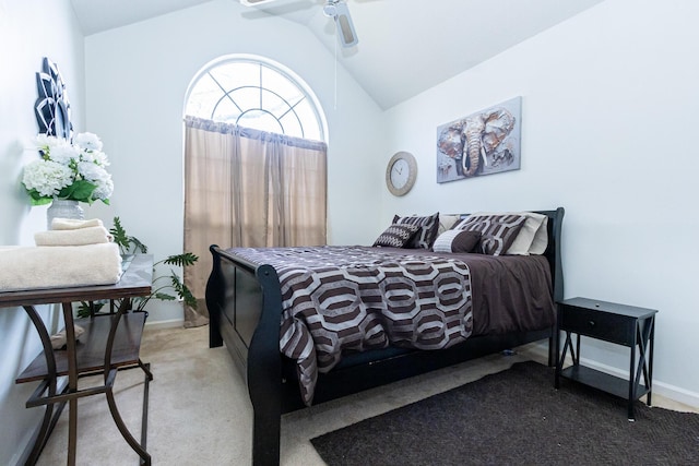 bedroom with carpet floors, lofted ceiling, baseboards, and a ceiling fan