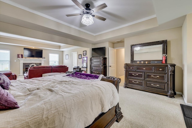 bedroom with light colored carpet, baseboards, ornamental molding, and multiple windows