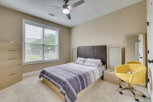 bedroom with baseboards, visible vents, a ceiling fan, and carpet floors
