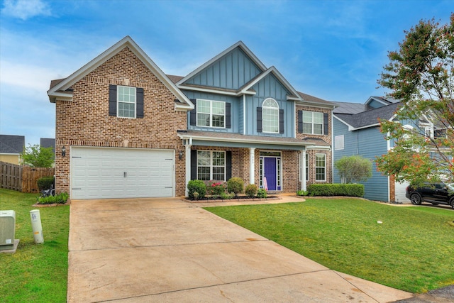 view of front of property with concrete driveway, board and batten siding, a front yard, an attached garage, and fence