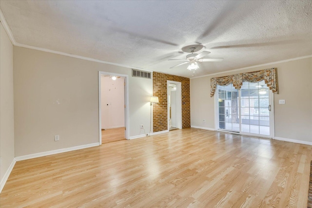 spare room featuring crown molding, ceiling fan, and light hardwood / wood-style flooring