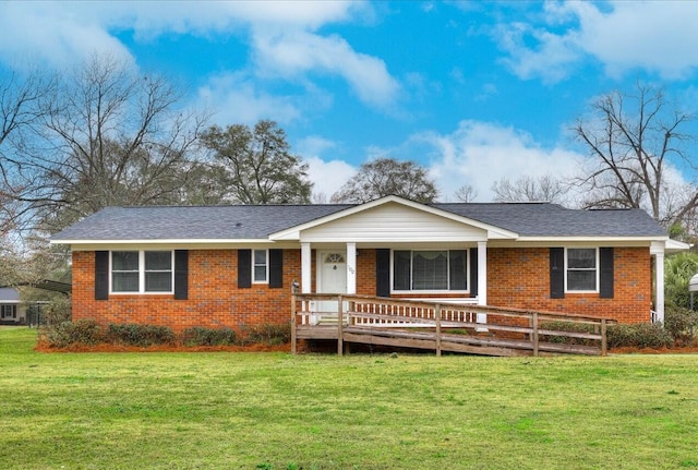 single story home with a front lawn