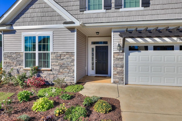 property entrance with a garage