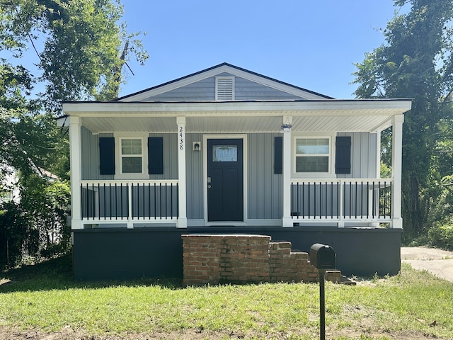 2438 N View Ave, Augusta, GA 30904 - view of front of house with covered porch and board and batten siding
