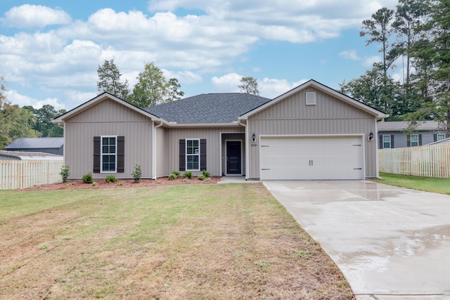 ranch-style home featuring a front yard and a garage