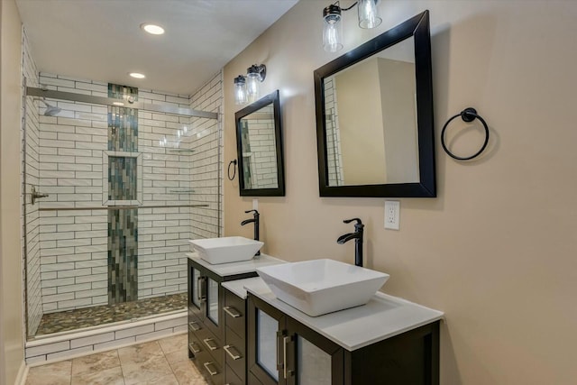 bathroom featuring vanity and walk in shower