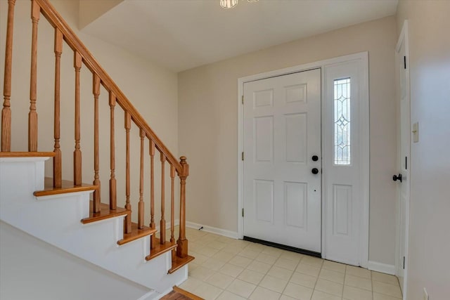 view of tiled foyer entrance