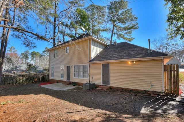 back of property featuring central AC unit and a patio area