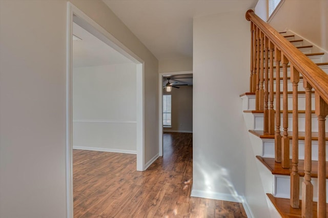 interior space with hardwood / wood-style flooring and ceiling fan