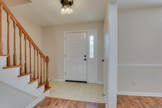 entrance foyer with light wood-type flooring