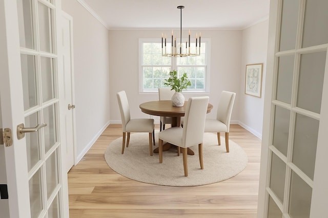 2079 Hillsinger Rd, Augusta, GA 30904 - dining area featuring light wood-style flooring, ornamental molding, and a chandelier