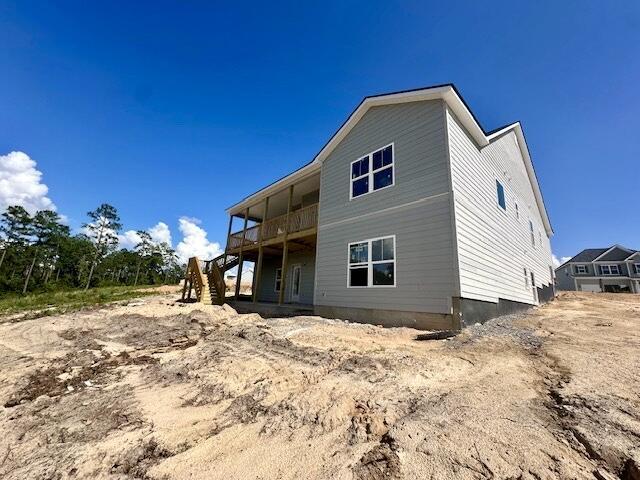 8144 Crossbow Lndg, Graniteville, SC 29829 - rear view of property featuring stairway and a wooden deck