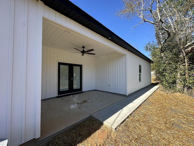 property entrance featuring ceiling fan, a patio, and french doors