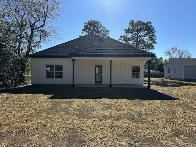 back of house with a patio area