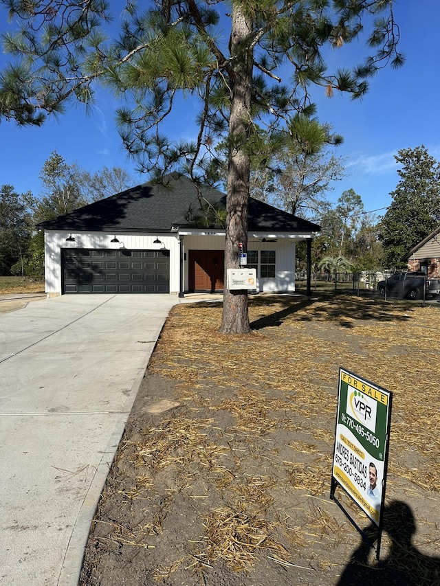 view of front of home with a garage