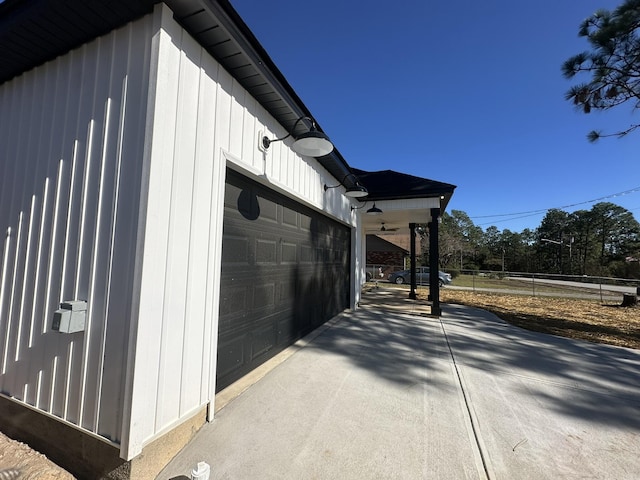 view of side of home with a garage