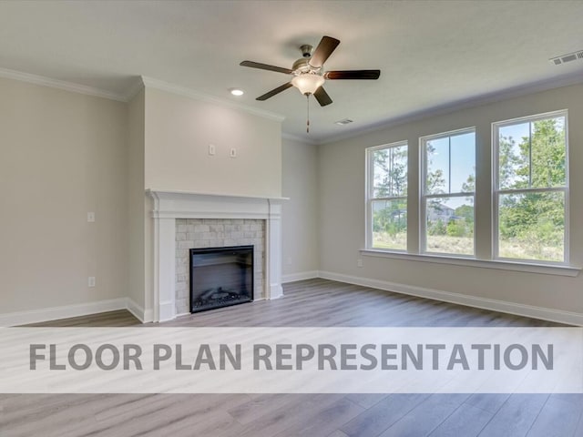 807 Lillian Park Dr Unit Lp2, Grovetown, GA 30813 - unfurnished living room featuring wood finished floors, ceiling fan, crown molding, baseboards, and a brick fireplace