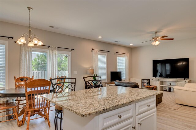 260 Claudia Dr, Grovetown, GA 30813 - kitchen featuring light wood-style floors, white cabinetry, ceiling fan, a chandelier, and recessed lighting