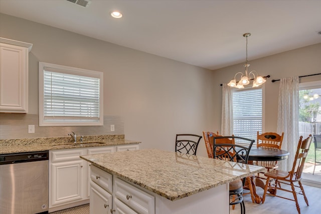 260 Claudia Dr, Grovetown, GA 30813 - kitchen featuring stainless steel dishwasher, a sink, a center island, a chandelier, and light wood finished floors