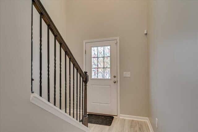 260 Claudia Dr, Grovetown, GA 30813 - doorway to outside featuring wood finished floors, baseboards, and stairway