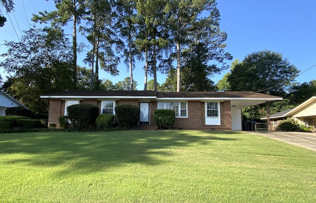 2416 Forest Park Rd, Augusta, GA 30904 - ranch-style home with a front yard, an attached carport, crawl space, brick siding, and concrete driveway