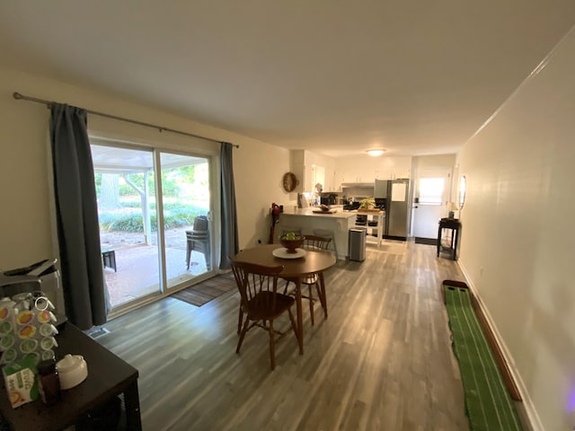 2416 Forest Park Rd, Augusta, GA 30904 - dining space featuring light wood-style floors and baseboards