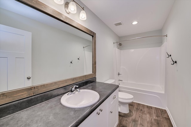 997 Glenhaven Dr, Evans, GA 30809 - bathroom with vanity, wood finished floors, and shower / bath combination