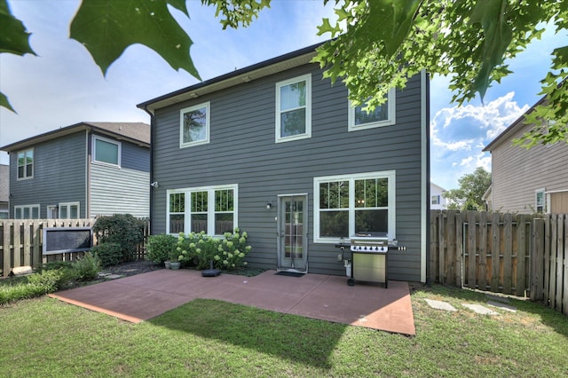 997 Glenhaven Dr, Evans, GA 30809 - rear view of property featuring a patio and a fenced backyard