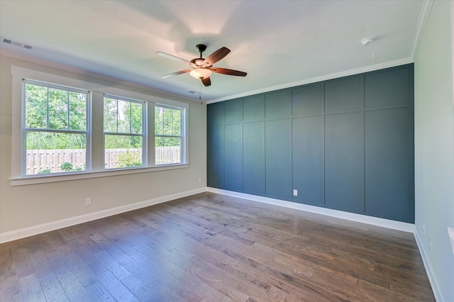 997 Glenhaven Dr, Evans, GA 30809 - spare room with crown molding, a ceiling fan, and dark wood-style floors