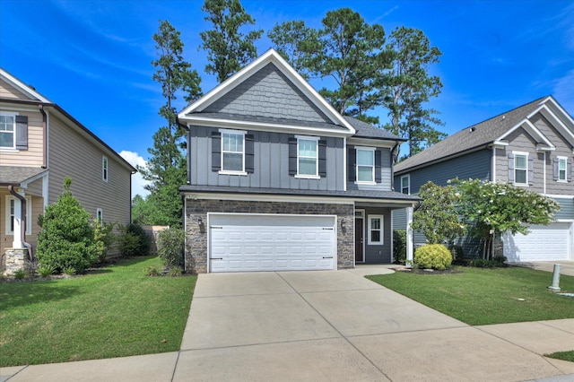 997 Glenhaven Dr, Evans, GA 30809 - craftsman inspired home with board and batten siding, an attached garage, stone siding, concrete driveway, and a front yard
