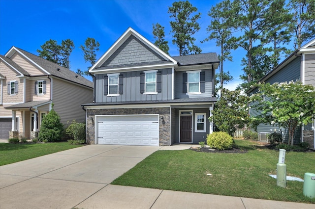 997 Glenhaven Dr, Evans, GA 30809 - craftsman inspired home with stone siding, board and batten siding, a garage, concrete driveway, and a front yard