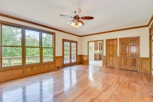 3549 Stevens Way, Martinez, GA 30907 - unfurnished room with a wainscoted wall, ceiling fan, light wood-style flooring, and crown molding